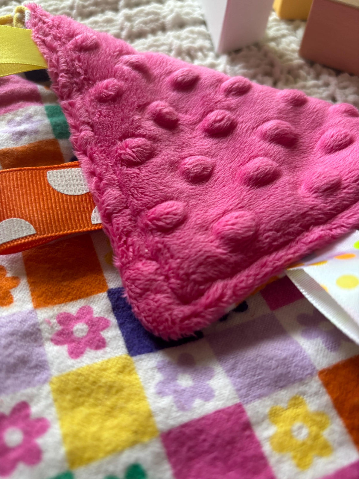 Groovy Daisy Check Baby Tag Blanket with Pink Minky Back | Sensory Ribbon Lovey